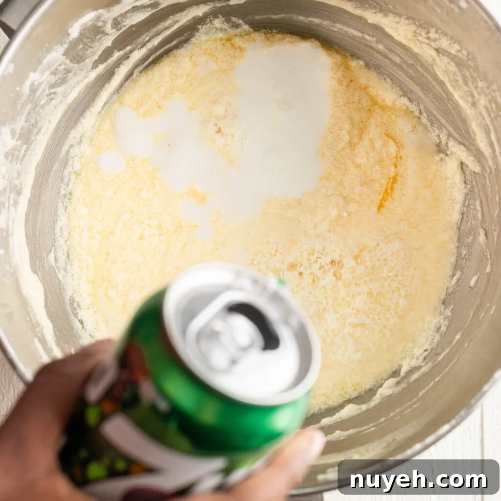 pouring in 7-up soda and buttermilk