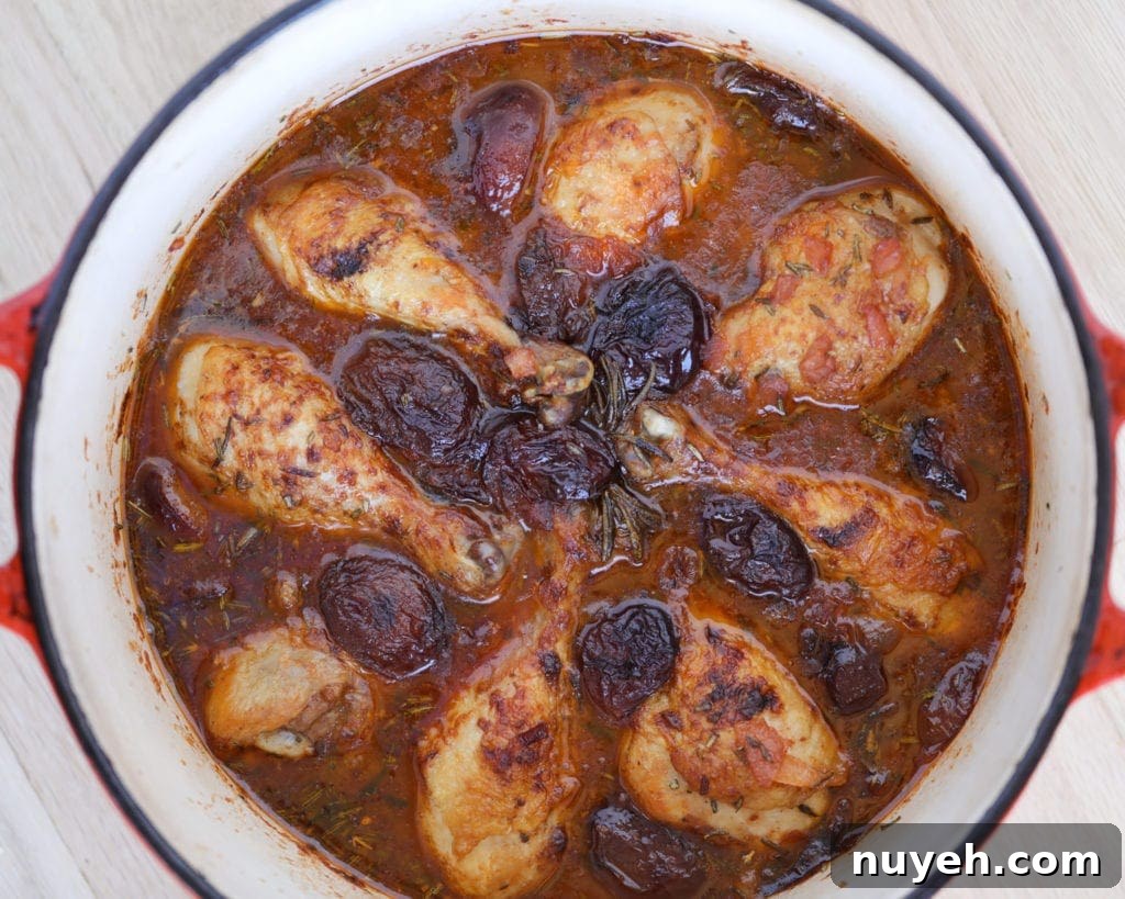 Red Wine-Braised Chicken with Plums Recipe 2 Chicken and sauce in a pan.