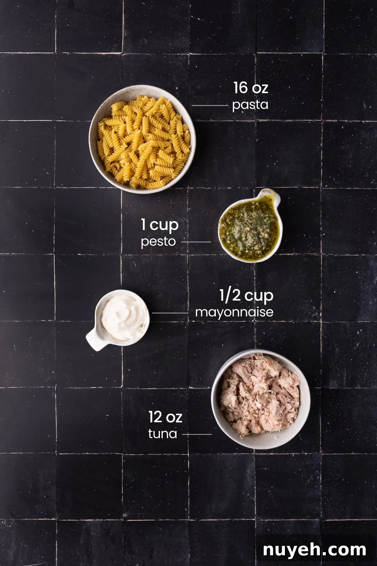 4-Ingredient Canned Tuna and Pesto Pasta Salad 3 Overhead view of the ingredients need for Tuna pesto pasta salad - pasta, pesto, mayonnaise, and Tuna.