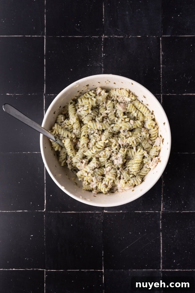 4-Ingredient Canned Tuna and Pesto Pasta Salad 7 Cold pesto pasta with tuna salad mixed in.