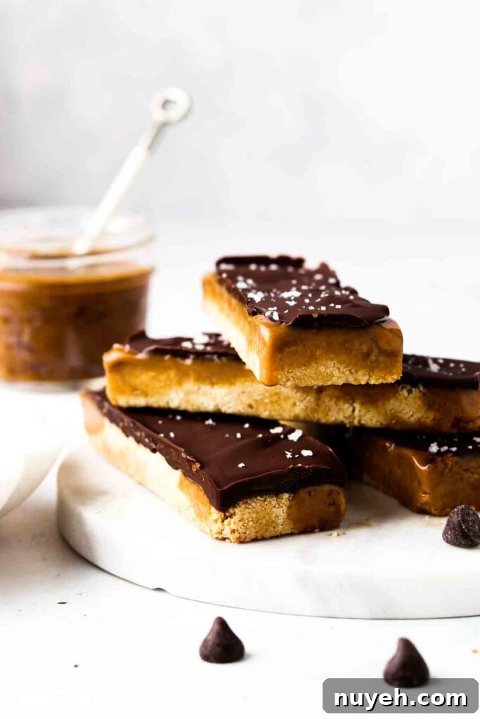 vegan twix bars 1 vegan twix bars stacked up on a plate with chocolate chips