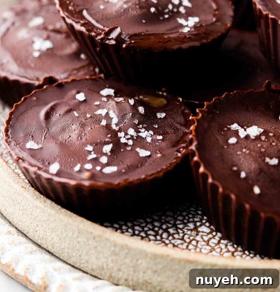vegan reeses 10 dairy free peanut butter cups stacked on a plate
